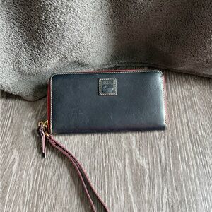 Dooney & Bourke Florentine Large Zip Around Wristlet (Navy Blue)
with Red Trim